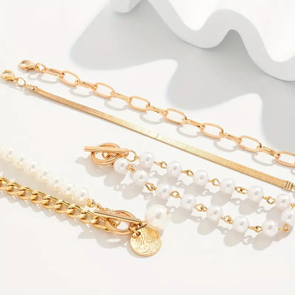 Chic Gold 4-Piece Bracelet Set – Snake, Pearls & Links | Gold
